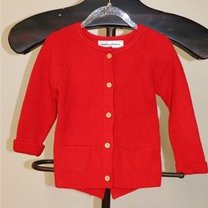 Smiling pinker sweater